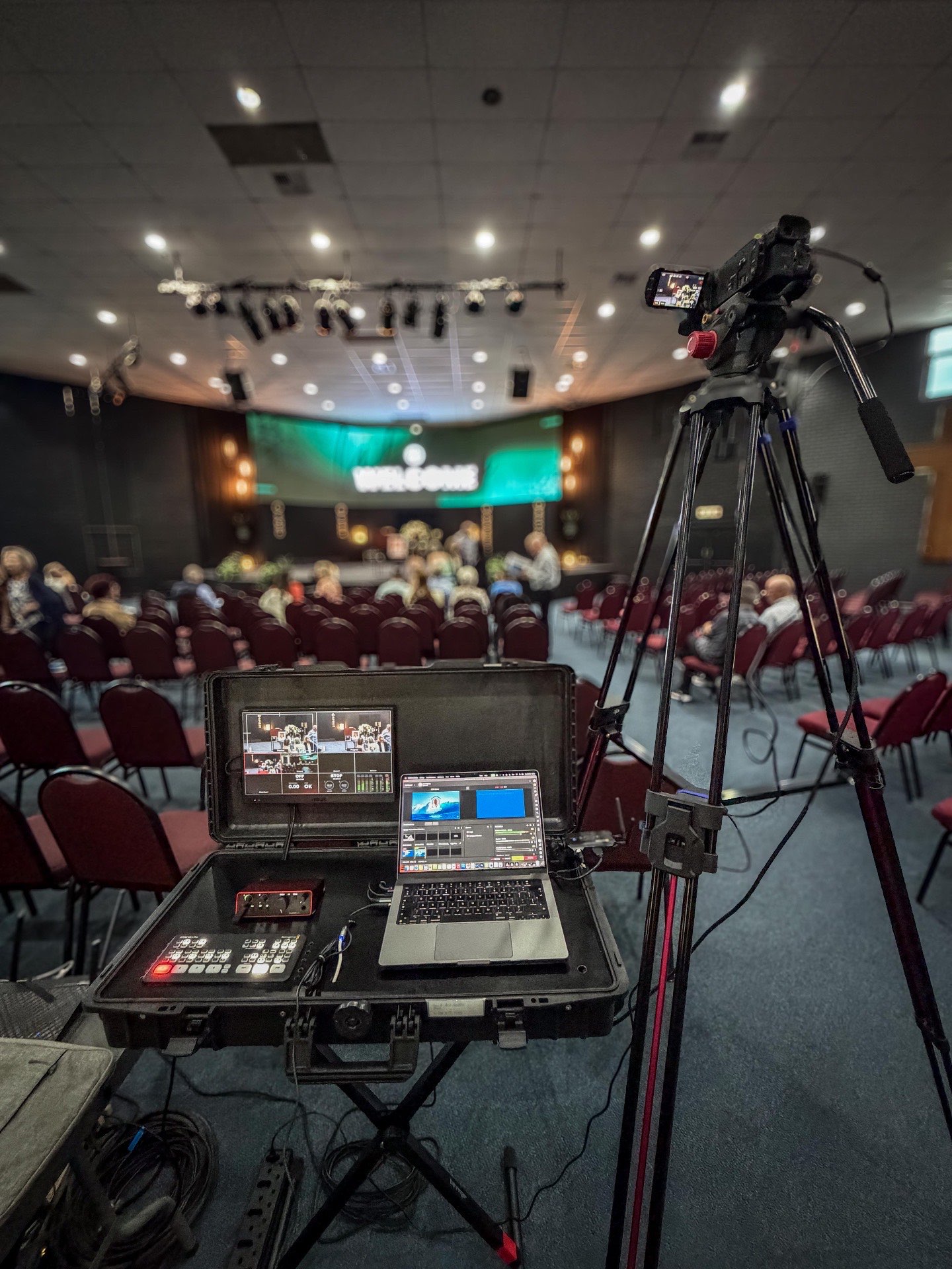 Streaming console with church stage in background
